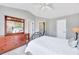 Bedroom featuring a dresser with a mirror and a comfortable bed at 3788 Chattahoochee Summit Se Dr # 22, Atlanta, GA 30339