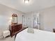 Cozy bedroom featuring plush carpet, neutral paint and wood furniture at 3788 Chattahoochee Summit Se Dr # 22, Atlanta, GA 30339