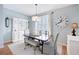 Cozy dining room with natural light, a large window, and elegant furnishings for Gathering meals at 3788 Chattahoochee Summit Se Dr # 22, Atlanta, GA 30339