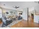 Open-concept living area with hardwood floors connecting kitchen and dining room at 3788 Chattahoochee Summit Se Dr # 22, Atlanta, GA 30339