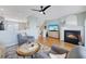 Cozy living room with a fireplace and hardwood floors leading into dining area at 3788 Chattahoochee Summit Se Dr # 22, Atlanta, GA 30339
