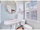 Powder room featuring stylish fixtures and natural light from the window at 3788 Chattahoochee Summit Se Dr # 22, Atlanta, GA 30339