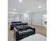 Spacious basement featuring recessed lights, plush sofas, and hardwood floors at 507 Karen Ln, Woodstock, GA 30188