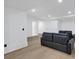Finished basement featuring neutral paint, plush sofas, and recessed lighting at 507 Karen Ln, Woodstock, GA 30188