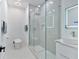 Modern bathroom featuring glass enclosed shower, sleek vanity, and a vessel sink at 507 Karen Ln, Woodstock, GA 30188