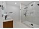 Modern bathroom featuring glass enclosed shower, dual vanity, and modern fixtures at 507 Karen Ln, Woodstock, GA 30188