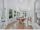 Dining room with bright natural light from windows and fireplace at 507 Karen Ln, Woodstock, GA 30188