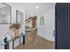Bright entryway featuring light wood floors, modern decor, and an open view to the living area at 507 Karen Ln, Woodstock, GA 30188