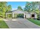 Home exterior featuring a driveway and garage with glass doors at 507 Karen Ln, Woodstock, GA 30188