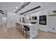 Bright kitchen features a large island with marble countertops, pendant lighting, and stainless steel appliances at 507 Karen Ln, Woodstock, GA 30188