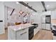The kitchen island features a marble countertop with brass hardware and an undermount sink at 507 Karen Ln, Woodstock, GA 30188