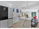Bright kitchen features stainless steel appliances, marble countertops, and an eat-in island at 507 Karen Ln, Woodstock, GA 30188