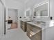 Elegant main bathroom featuring double vanity, modern fixtures, and recessed lighting at 507 Karen Ln, Woodstock, GA 30188