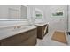 Bright main bathroom features double vanity, modern faucets, and recessed lighting at 507 Karen Ln, Woodstock, GA 30188