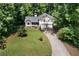 Scenic aerial view of a home nestled among lush trees, showcasing its private and serene setting at 83 Andrew Jackson Ct, Dallas, GA 30157