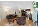 Comfortable living room with hardwood floors, a stone fireplace, and a cozy seating arrangement at 83 Andrew Jackson Ct, Dallas, GA 30157