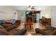 Spacious living room featuring a cozy fireplace, hardwood floors, and ample seating for entertaining at 83 Andrew Jackson Ct, Dallas, GA 30157
