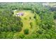 Expansive estate with a home nestled among the trees, offering privacy and natural beauty at 1101 N Flat Rock Rd, Douglasville, GA 30134