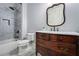 Elegant bathroom features a marble shower, unique vanity, and patterned tile flooring at 1101 N Flat Rock Rd, Douglasville, GA 30134
