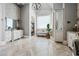This primary bathroom features double sinks, a soaking tub and a gorgeous chandelier at 1101 N Flat Rock Rd, Douglasville, GA 30134