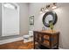 Charming powder room with rustic vanity, copper sink, and unique decor at 1101 N Flat Rock Rd, Douglasville, GA 30134