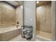 Modern bathroom featuring a soaking tub and tiled walk-in shower, perfect for relaxation at 1101 N Flat Rock Rd, Douglasville, GA 30134