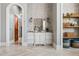 The bathroom includes ample storage with its shelving and built in vanity with drawers at 1101 N Flat Rock Rd, Douglasville, GA 30134