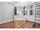 Custom closet with mirrored closet doors, custom ladder and access to laundry room at 1101 N Flat Rock Rd, Douglasville, GA 30134