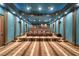 Spacious home theater featuring tiered seating, projector, and custom lighting perfect for entertainment at 1101 N Flat Rock Rd, Douglasville, GA 30134
