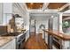 Spacious kitchen with stainless steel appliances, granite countertops, and wood ceiling at 1101 N Flat Rock Rd, Douglasville, GA 30134