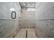 A spacious tile shower with multiple shower heads and geometric tile pattern at 1101 N Flat Rock Rd, Douglasville, GA 30134