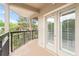 Open air balcony view of community trees at 1502 River Green Nw Dr # 1502, Atlanta, GA 30327