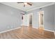 Bedroom with hardwood floors, closet, and bathroom access at 1502 River Green Nw Dr # 1502, Atlanta, GA 30327