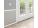 Close up view of white patio doors with matching plantation shutters at 1502 River Green Nw Dr # 1502, Atlanta, GA 30327