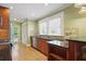 Bright eat-in kitchen features stainless steel appliances and granite countertops for a modern touch at 203 Lucerne St, Decatur, GA 30030