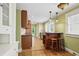 Charming kitchen with hardwood floors, bar seating, and ample cabinet space for a vintage feel at 203 Lucerne St, Decatur, GA 30030