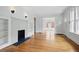 Bright living room with hardwood floors, fireplace, and built-in shelving, bathed in natural light at 203 Lucerne St, Decatur, GA 30030