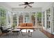 Cozy sunroom furnished with seating, a rug, and a coffee table, creating a relaxing atmosphere at 203 Lucerne St, Decatur, GA 30030