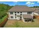 Backyard with a covered patio, fenced yard, and lawn at 319 Parkside Meadow Dr, Marietta, GA 30064