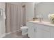Modern bathroom with a shower tub and vanity at 319 Parkside Meadow Dr, Marietta, GA 30064