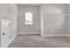 Spacious walk-in closet with carpeted floors and built-in shelving at 319 Parkside Meadow Dr, Marietta, GA 30064