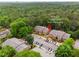 Charming condos nestled in a lush, wooded area with convenient parking and serene surroundings at 605 Parkaire Xing, Marietta, GA 30068
