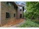 Exterior of home with a paved walkway and lush greenery at 605 Parkaire Xing, Marietta, GA 30068