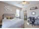 Spacious bedroom with a desk, and doorway leading to another room at 660 Delbridge Nw St, Atlanta, GA 30314