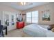 Cozy bedroom featuring a large window, full bed, and charming decor at 660 Delbridge Nw St, Atlanta, GA 30314