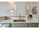 Bright and stylish kitchen featuring stone countertops and stainless steel appliances at 660 Delbridge Nw St, Atlanta, GA 30314