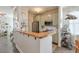 Stylish kitchen with stainless steel appliances, a butcher block countertop, and modern finishes at 660 Delbridge Nw St, Atlanta, GA 30314