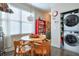 Bright and airy kitchen/dining area with in-unit laundry at 660 Delbridge Nw St, Atlanta, GA 30314