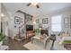 Cozy living room featuring neutral tones, a decorative fireplace, and hardwood floors at 660 Delbridge Nw St, Atlanta, GA 30314