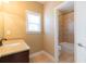 Bathroom features a shower/tub combo with tile surround, vanity with granite counters, and neutral walls at 335 Roberts Run Cv, Suwanee, GA 30024